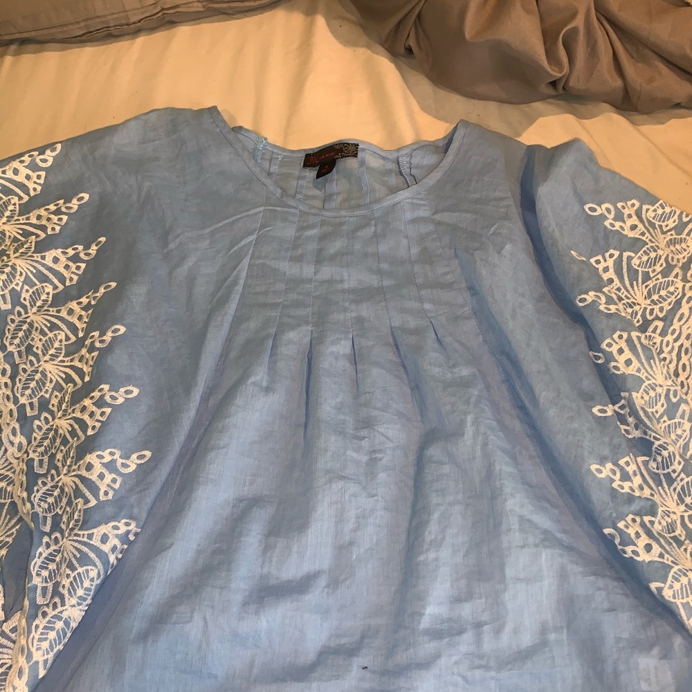 Super cute winged blouse
